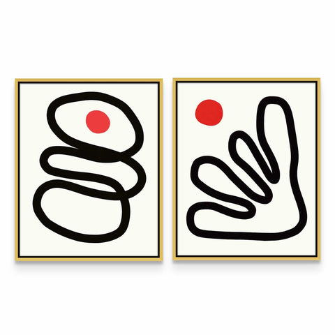 two black and white paintings with a red dot