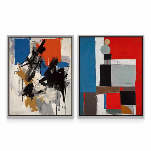 a couple of paintings sitting on top of a wall