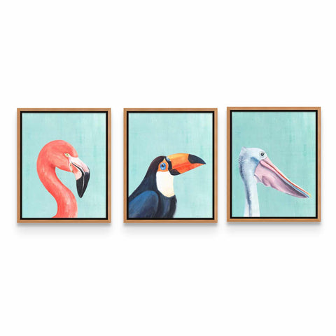 three paintings of birds hanging on a wall