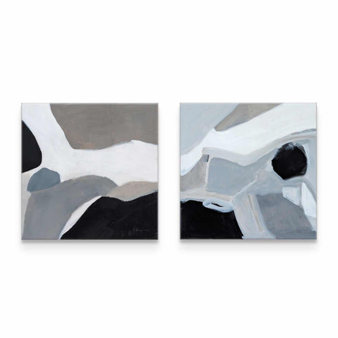 two paintings of different shapes and sizes on a wall