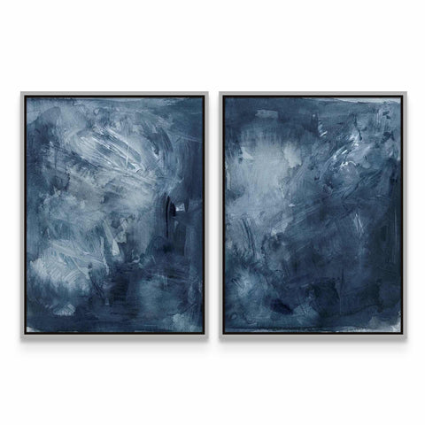two paintings of blue and white paint on a white wall