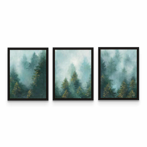 three framed paintings of trees in a foggy forest