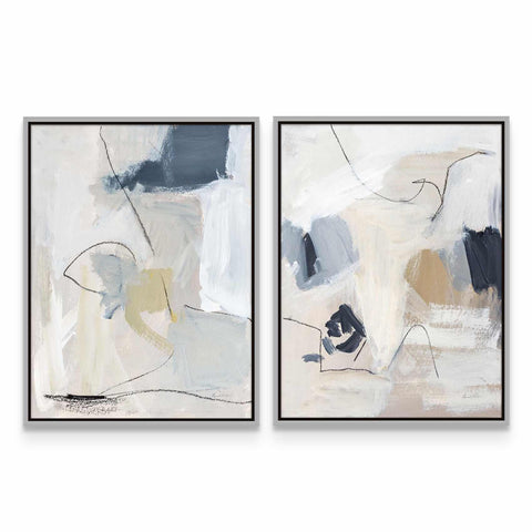 two abstract paintings on a white wall