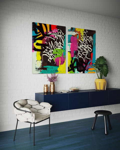 a living room with two paintings on the wall