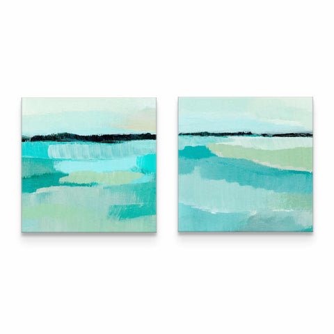 two paintings of blue and green water on a white wall