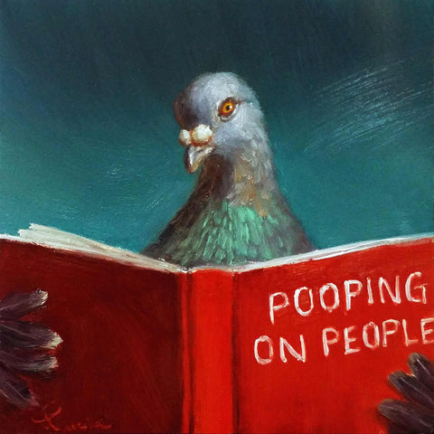 a pigeon sitting on top of a red book
