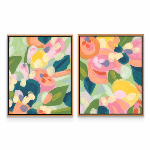 two paintings of flowers on a white wall