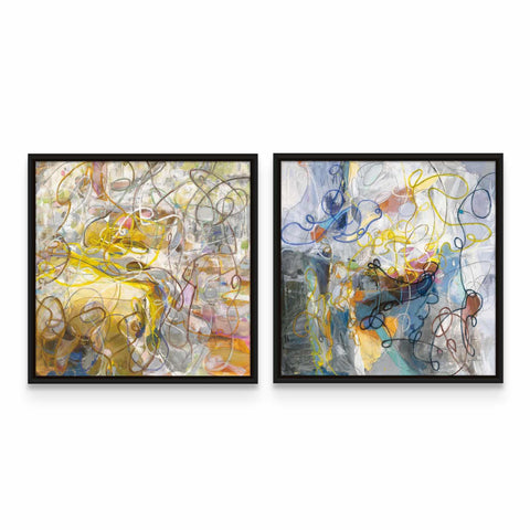 two framed paintings of abstract art on a wall