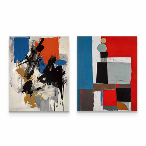 a couple of paintings sitting on top of a white wall