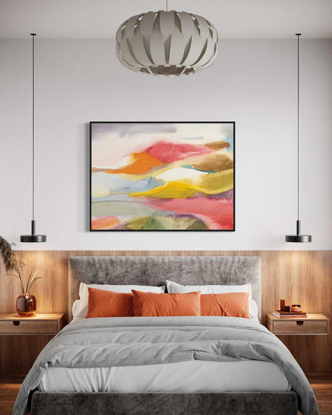 a bedroom with a large bed and a painting on the wall