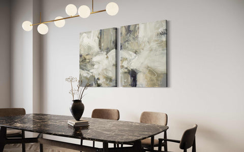 a dining room table with a vase of flowers on top of it