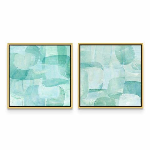 two framed paintings of blue and green shapes
