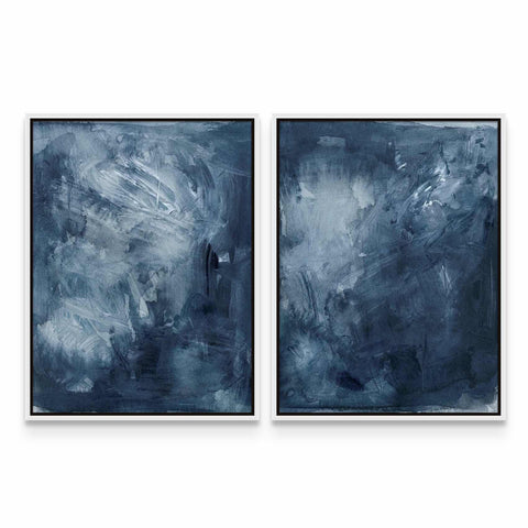 two paintings of blue and white on a white wall