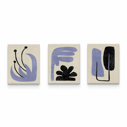 three abstract paintings on a white wall