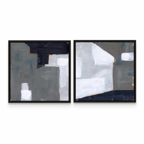 two paintings of white and black on a white wall