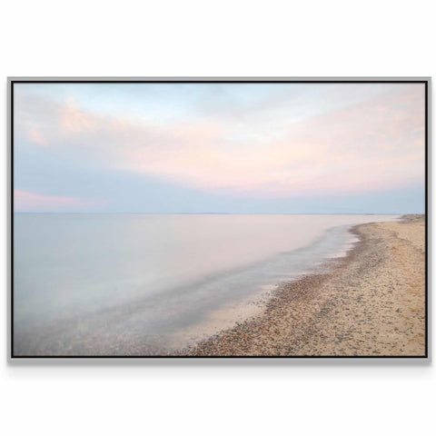 a picture of a beach with the ocean in the background