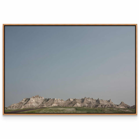 a picture of a mountain range with a sky background