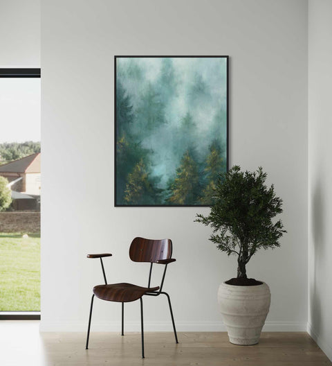 a painting hanging on a wall next to a chair