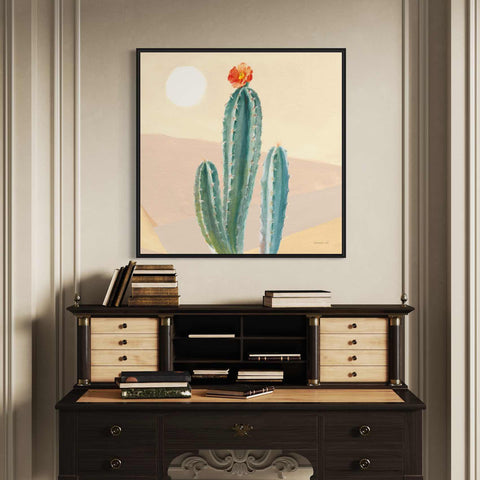 a painting of a cactus on a wall above a dresser