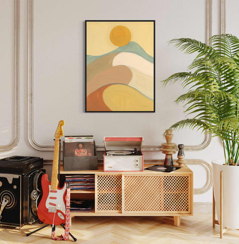 a living room with a guitar and a plant