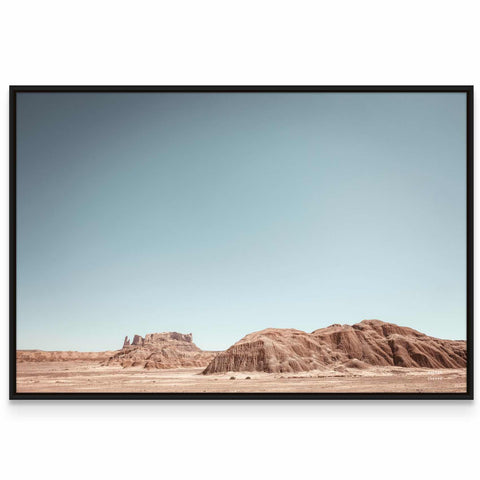 a picture of a desert landscape with mountains in the background