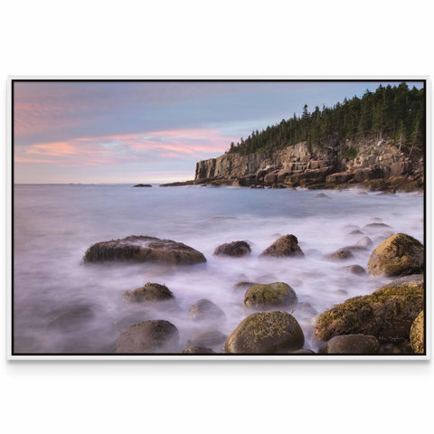 a picture of some rocks in the water