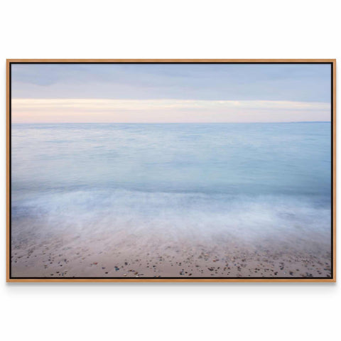 a picture of a beach with the ocean in the background