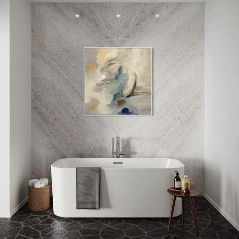 a bathroom with a bathtub and a painting on the wall