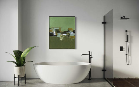 a bathroom with a large white tub and a green painting on the wall