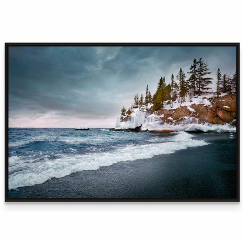 a picture of a beach with trees on the shore