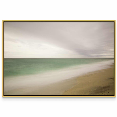 a picture of a beach with waves coming in