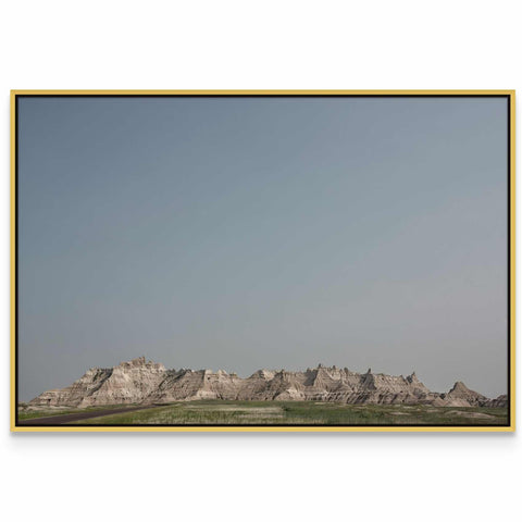 a picture of a mountain range with a yellow frame