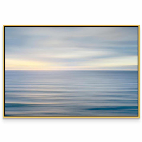 a picture of a blue ocean with a yellow frame