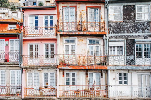 a group of buildings with balconies and balconies on them