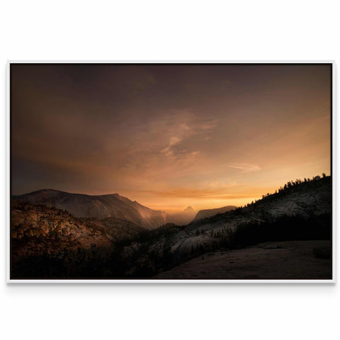 a picture of a sunset in the mountains