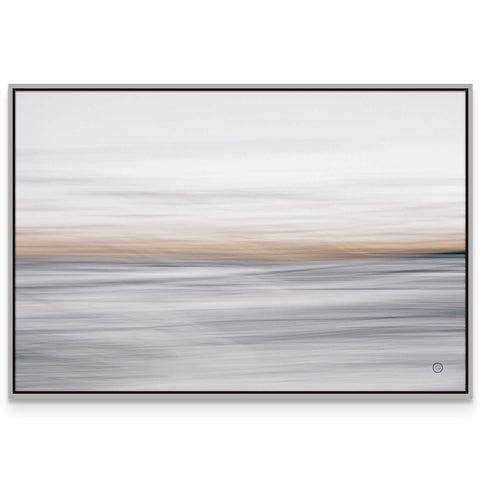 a white and grey abstract painting on a wall