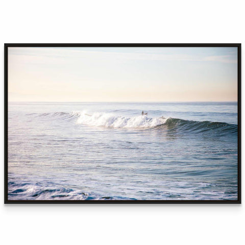 a picture of a surfer riding a wave in the ocean