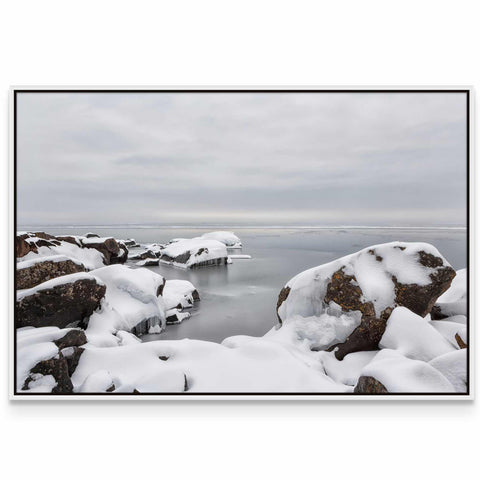 a picture of some rocks covered in snow