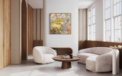 a living room filled with furniture and a painting on the wall