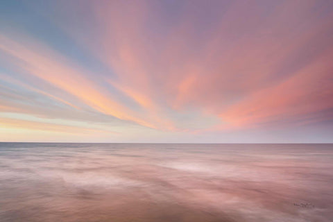 a long exposure of a sunset over the ocean