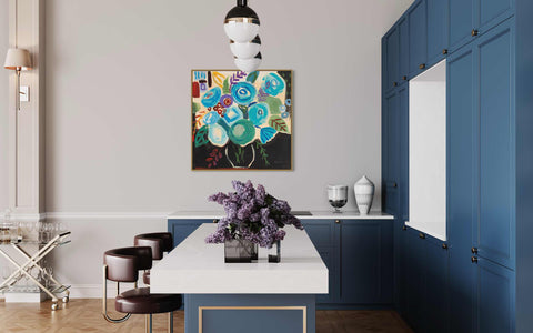 a kitchen with blue cabinets and a white counter top