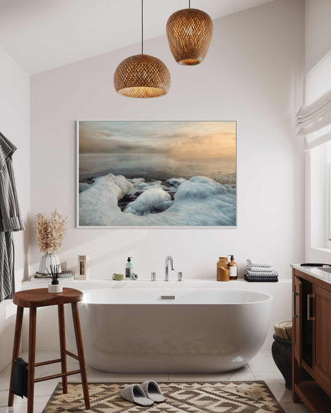 a bathroom with a large bathtub and a painting on the wall