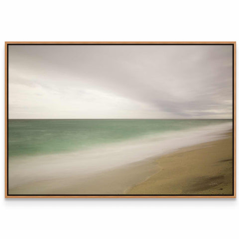 a picture of a beach with waves coming in