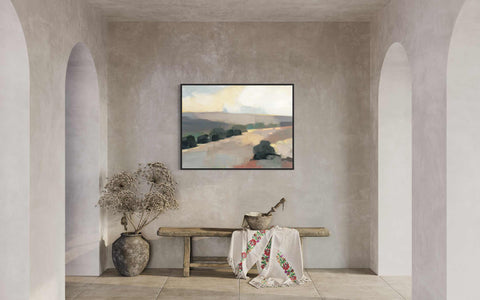 a room with a bench and a painting on the wall