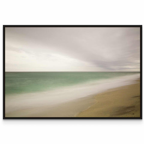 a picture of a beach with waves coming in