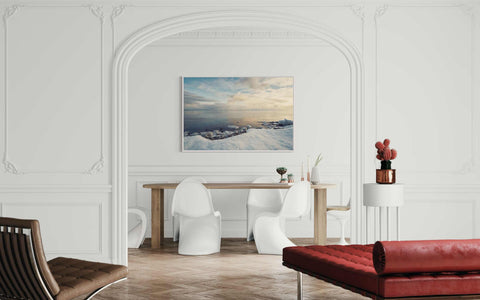 a living room with white walls and a red couch