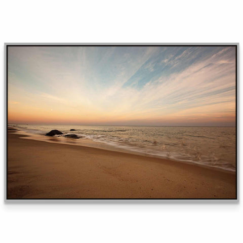 a picture of a beach with waves coming in