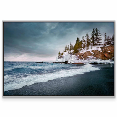 a picture of a beach with trees on the shore