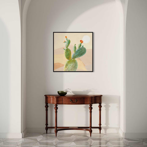 a painting of a cactus on a wall above a table