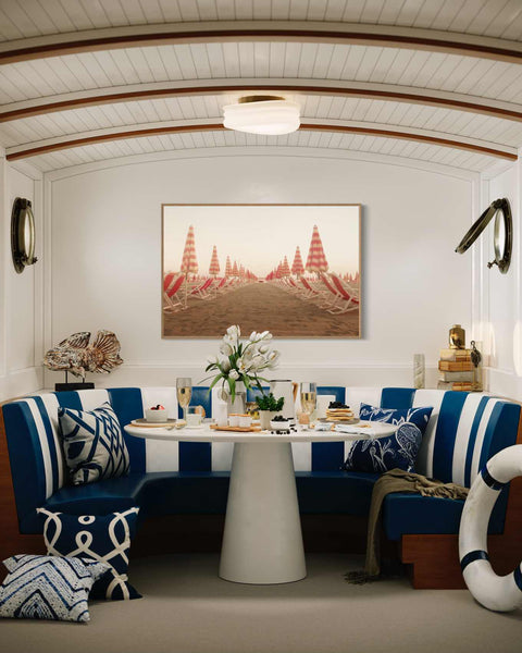 a dining room with blue and white striped chairs